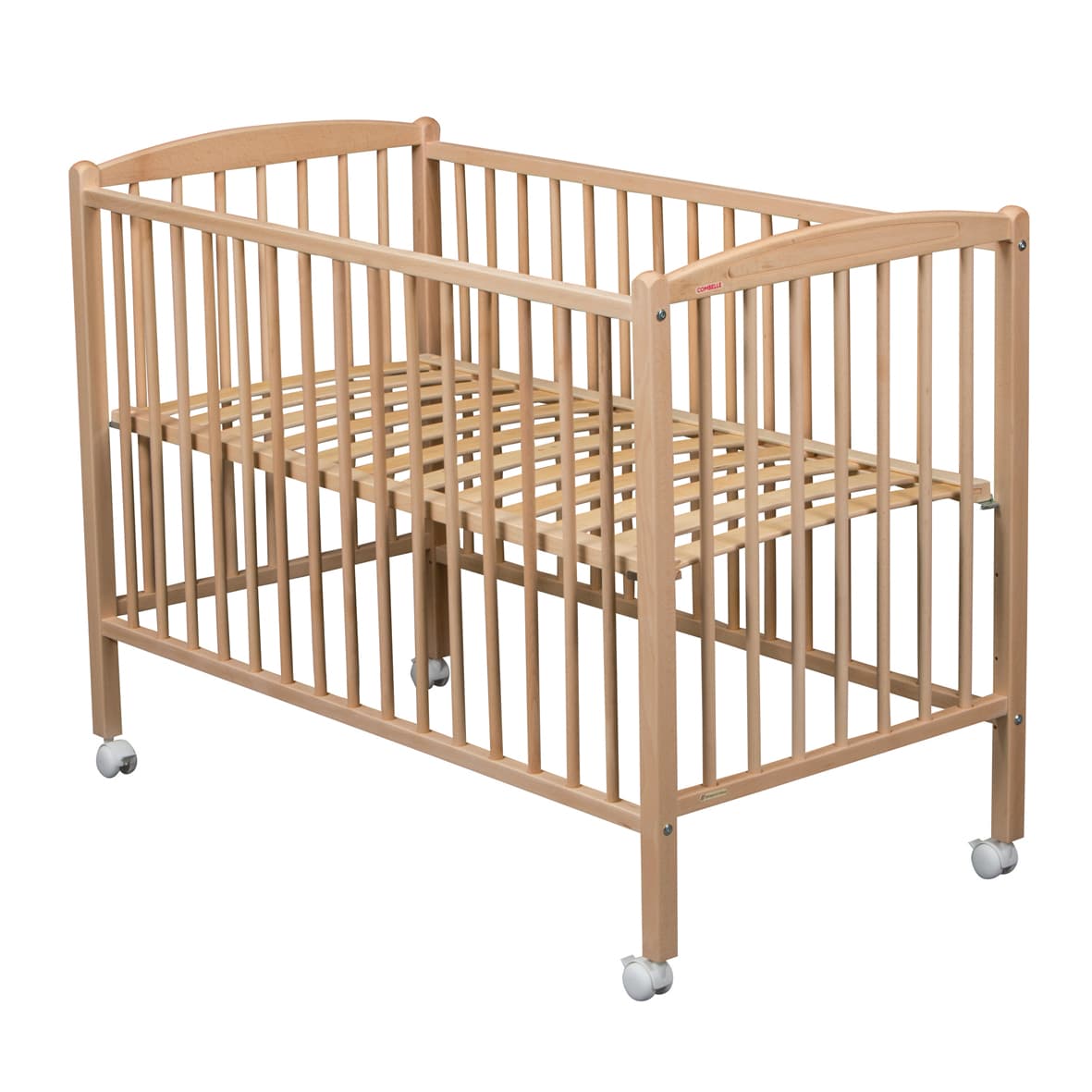 lit bébé à barreaux 70x140 cm sur roulettes en bois naturel finition vernis combelle